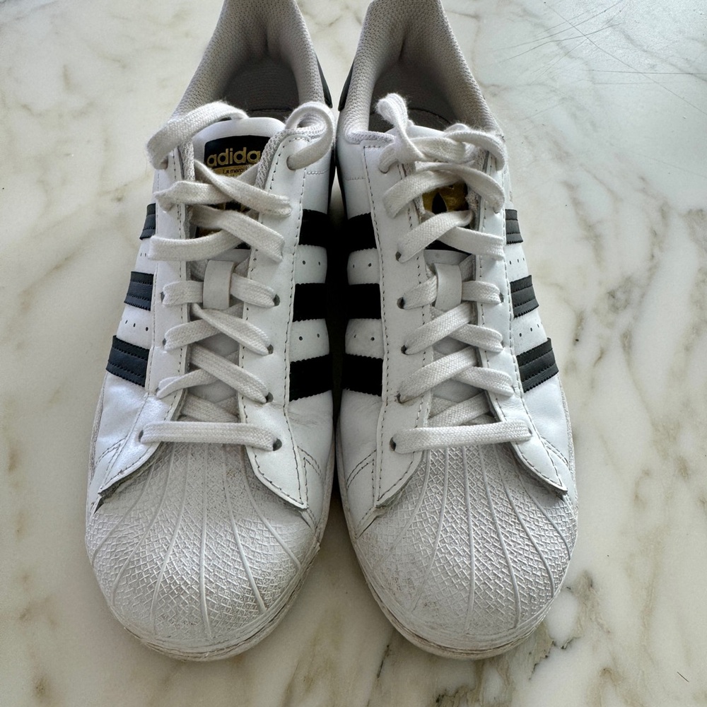 Adidas Superstar, white with black stripes, women’s size 8.5. Worn twice.